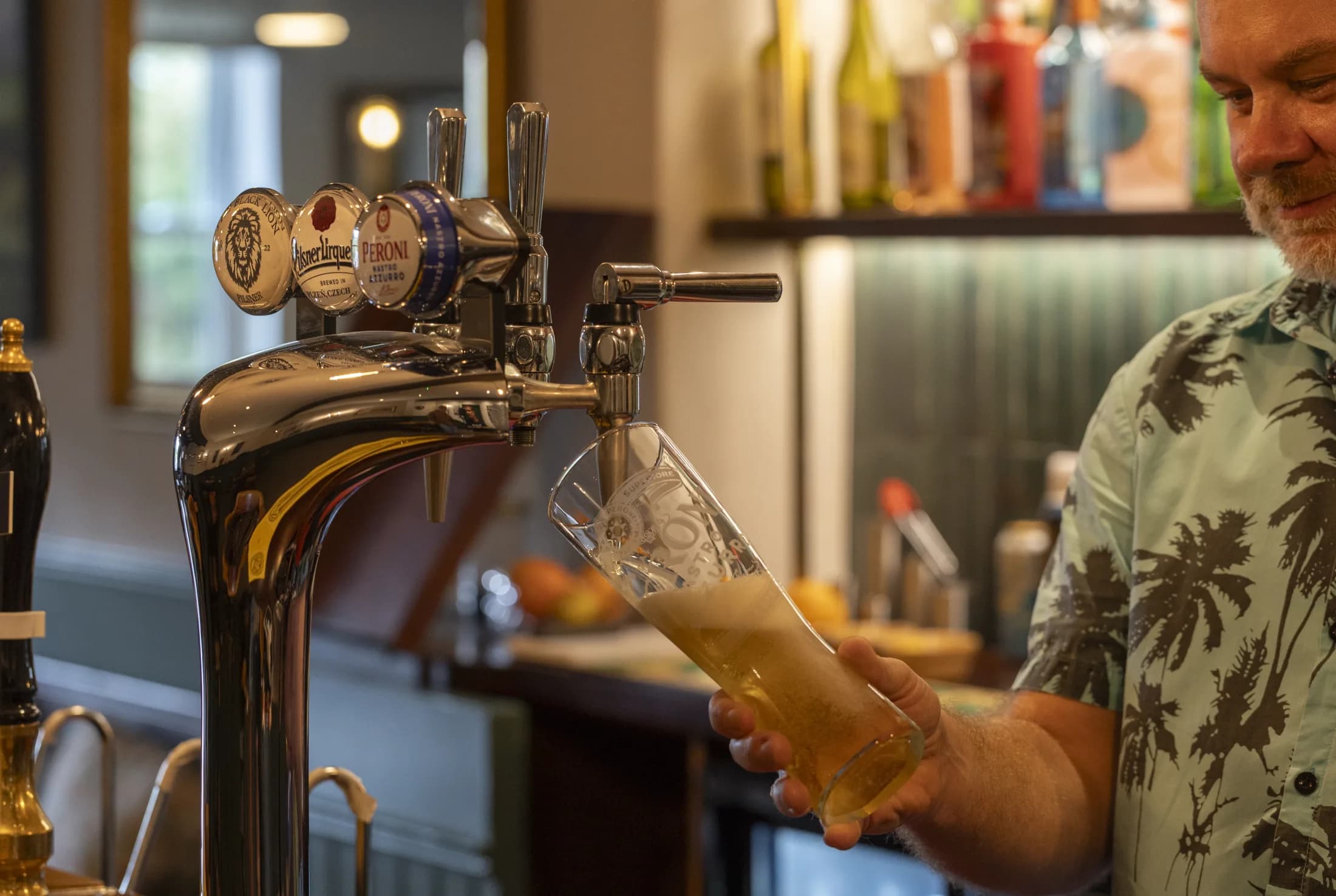 A pint being poured at The Black Lion bar